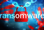 Image of computer code with a lock in front of it